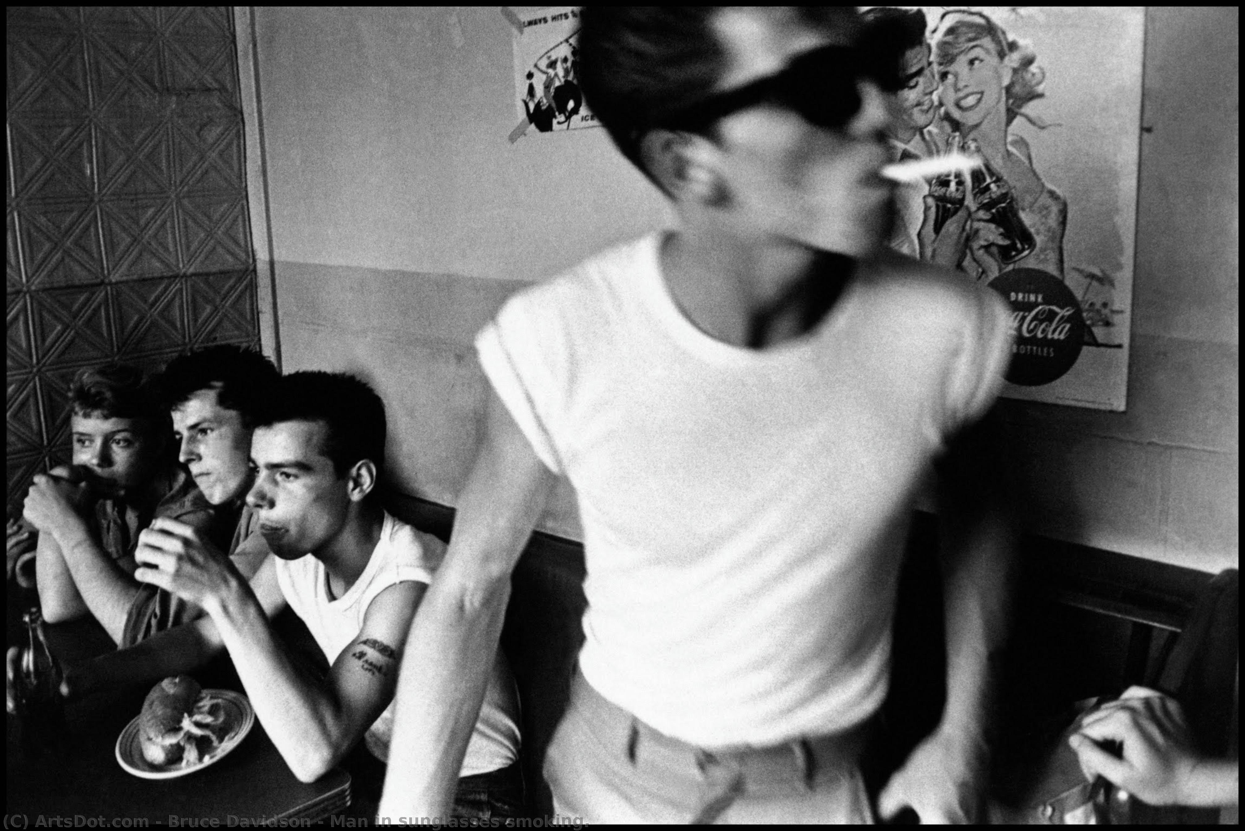 Bruce Davidson - Man in sunglasses smoking.