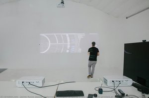 Information Designer Prepares A Test Projection To Preview An Accompanying Interactive Installation Inside The Ira Gershwin Gallery, Inside Walt Disney Concert Hall. — Jackie Russo Jaquez